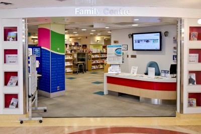 Doorway labeled Family Centre showing a desk and library area