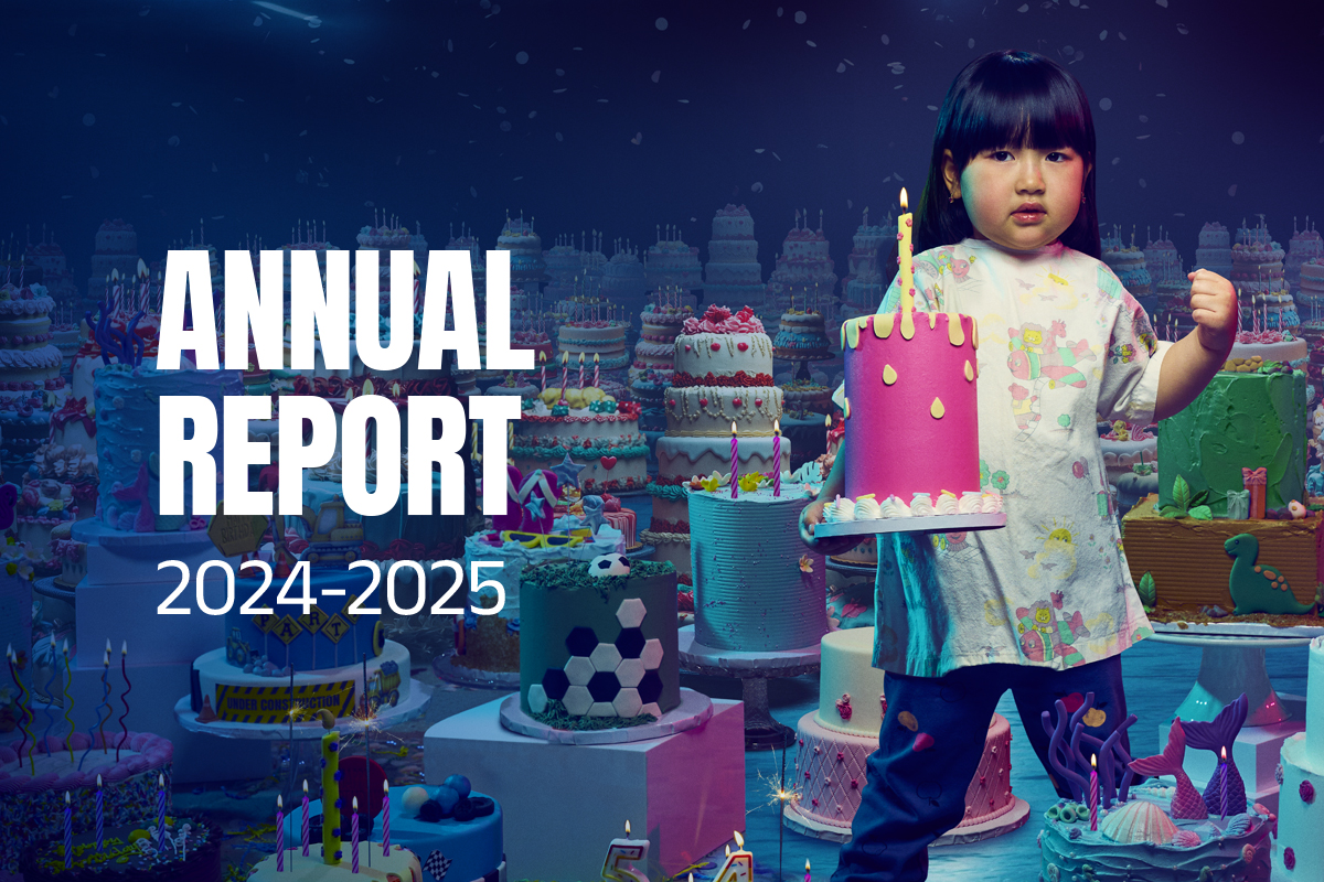 A girl stands holding a birthday cake, in a sea of birthday cakes. Text reads Annual Report 2024-2025.