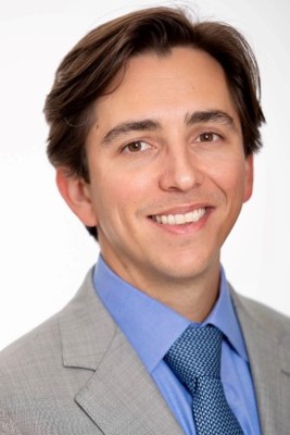 Headshot of Adam Mosa