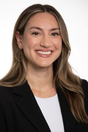 headshot of Brooke Allemang smiling at the camera