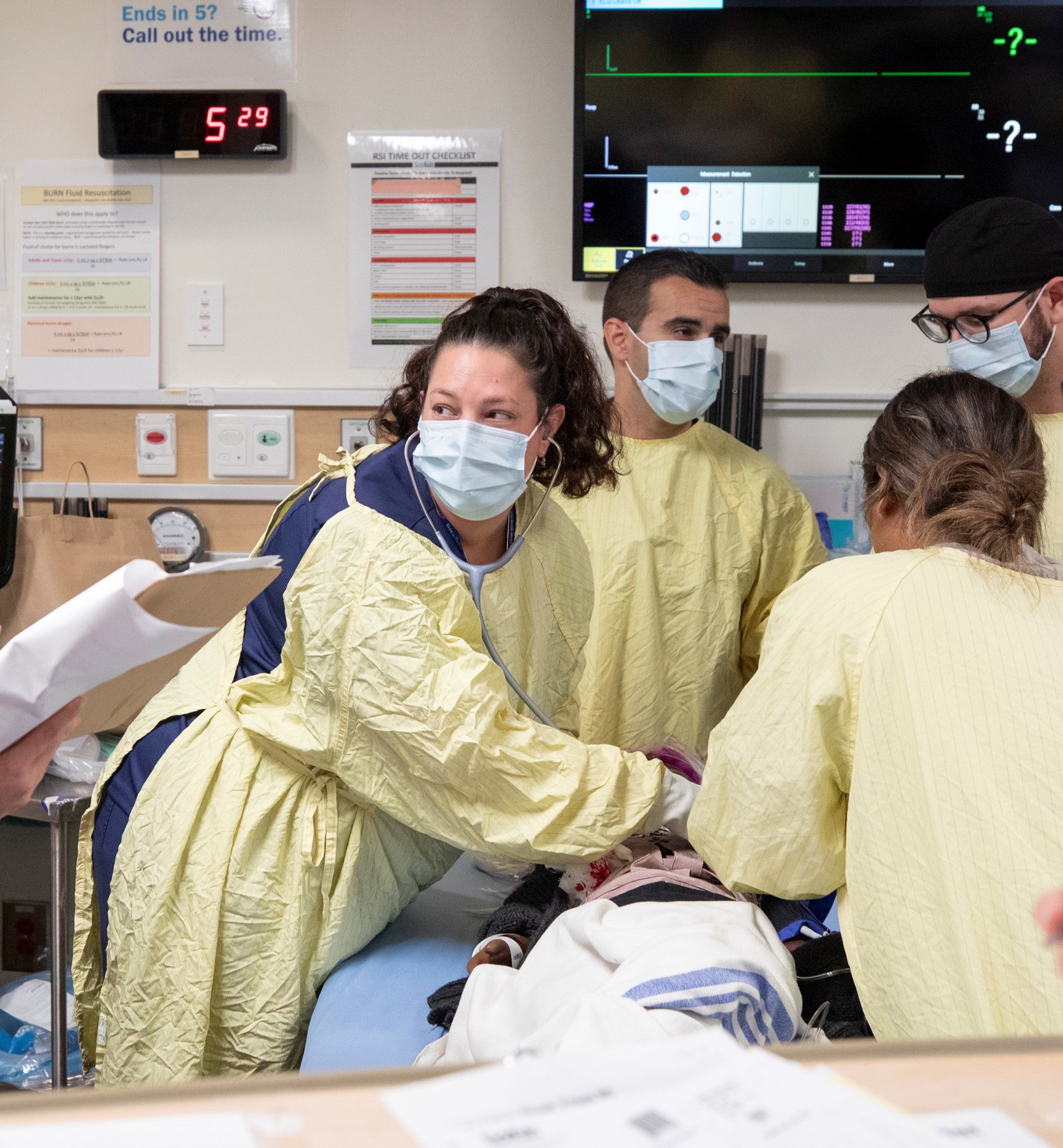 A care team treating a simulated patient in a Code Orange simulation
