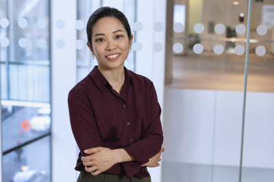 Dr. Jennifer Quon smiling and posing for a photo inside the Patient Support Centre.