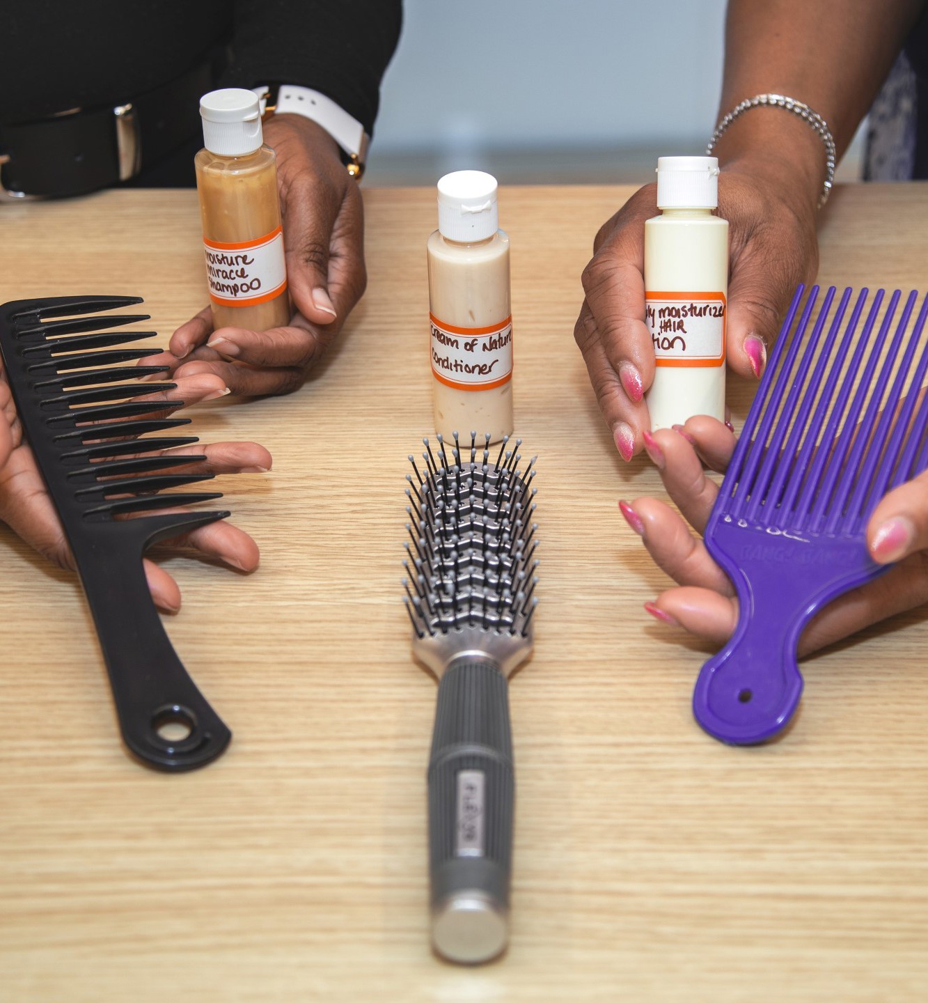 Hair products, including shampoo, conditioner, and combs, used for the Hair Equity initiative