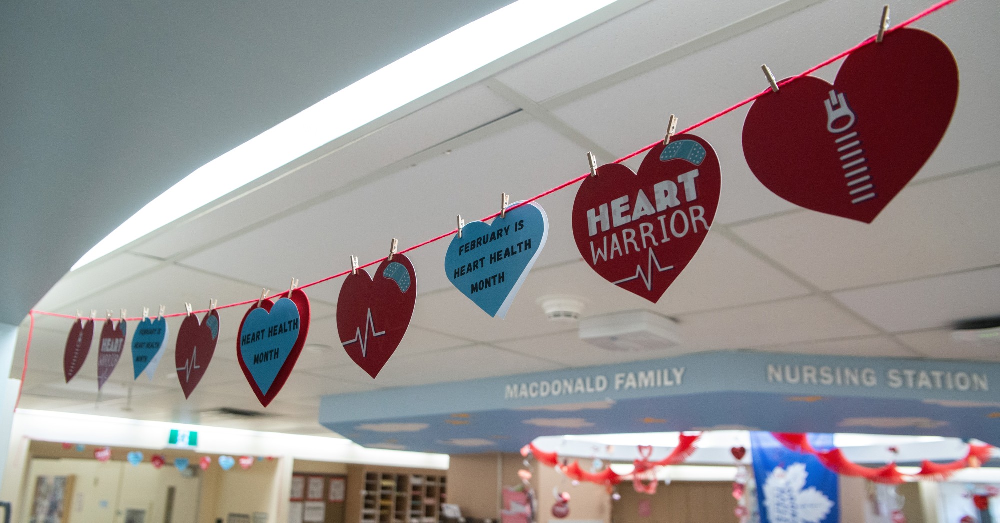 A banner of heart decorations hangs in SickKids' Cardiology unit.